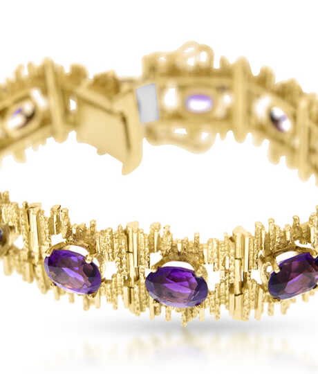 Yellow gold vintage bracelet with 11 oval amethysts