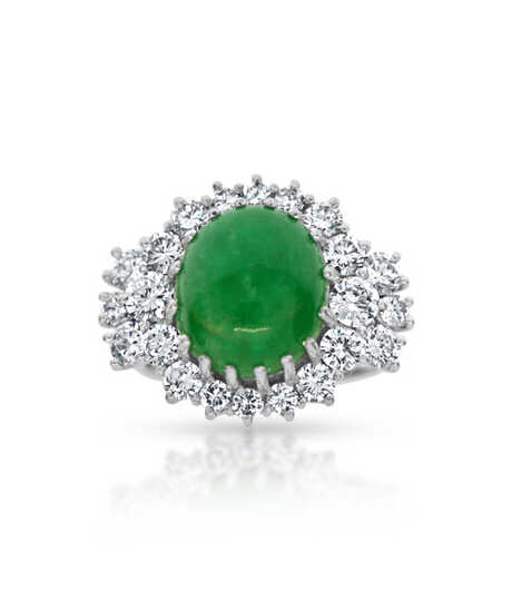 Platinum ring with oval emerald cabochon and diamonds