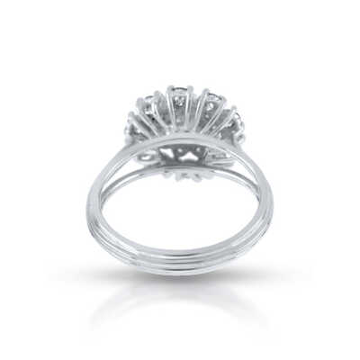 Ring in white gold with solitaire and entourage in 2 rows with 20 diamonds