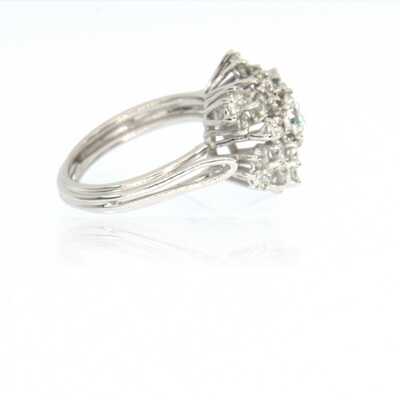 Ring in white gold with solitaire and entourage in flower shape