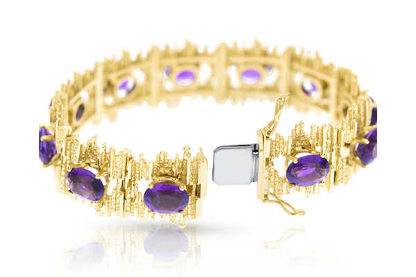 Yellow gold vintage bracelet with 11 oval amethysts