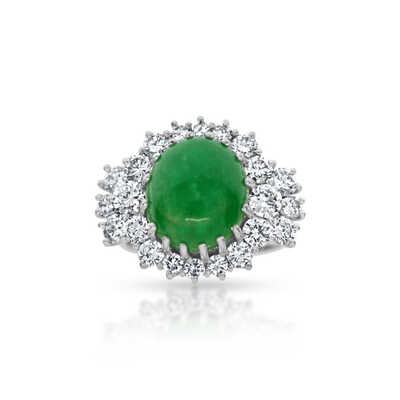 Platinum ring with oval emerald cabochon and diamonds