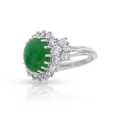 Platinum ring with oval emerald cabochon and diamonds